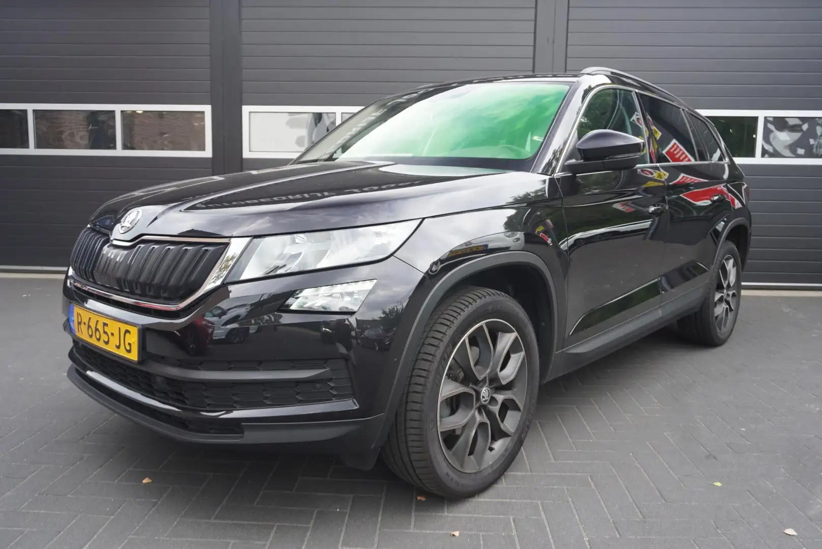 Skoda Kodiaq 1.5 TSI Ambition Aut/Camera/Elek.Trekhaak/Navi/CC/ Noir - 1