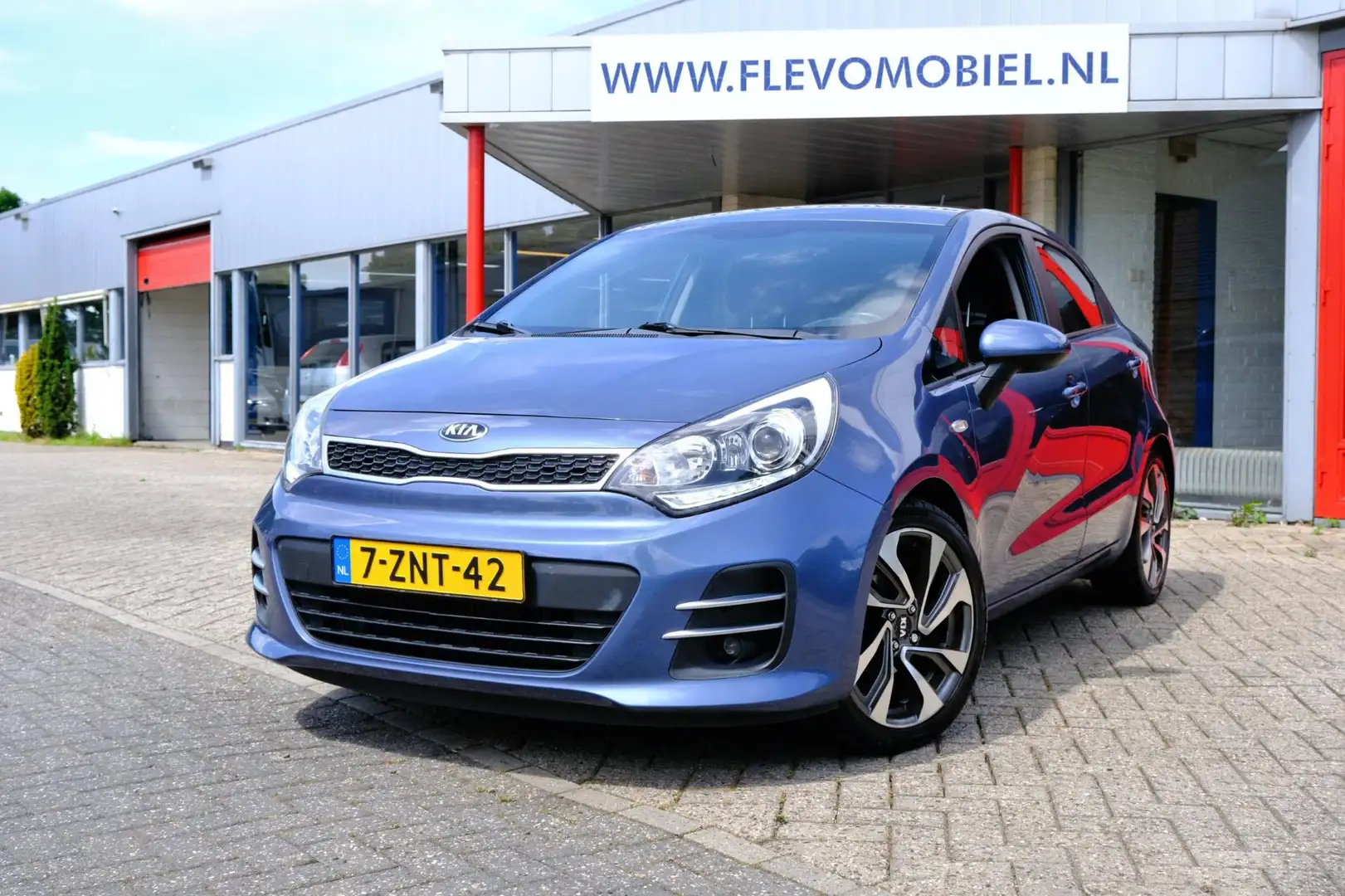 Kia Rio 1.2 CVVT DynamicLine 5-drs Airco|LMV|Cruise Kék - 1