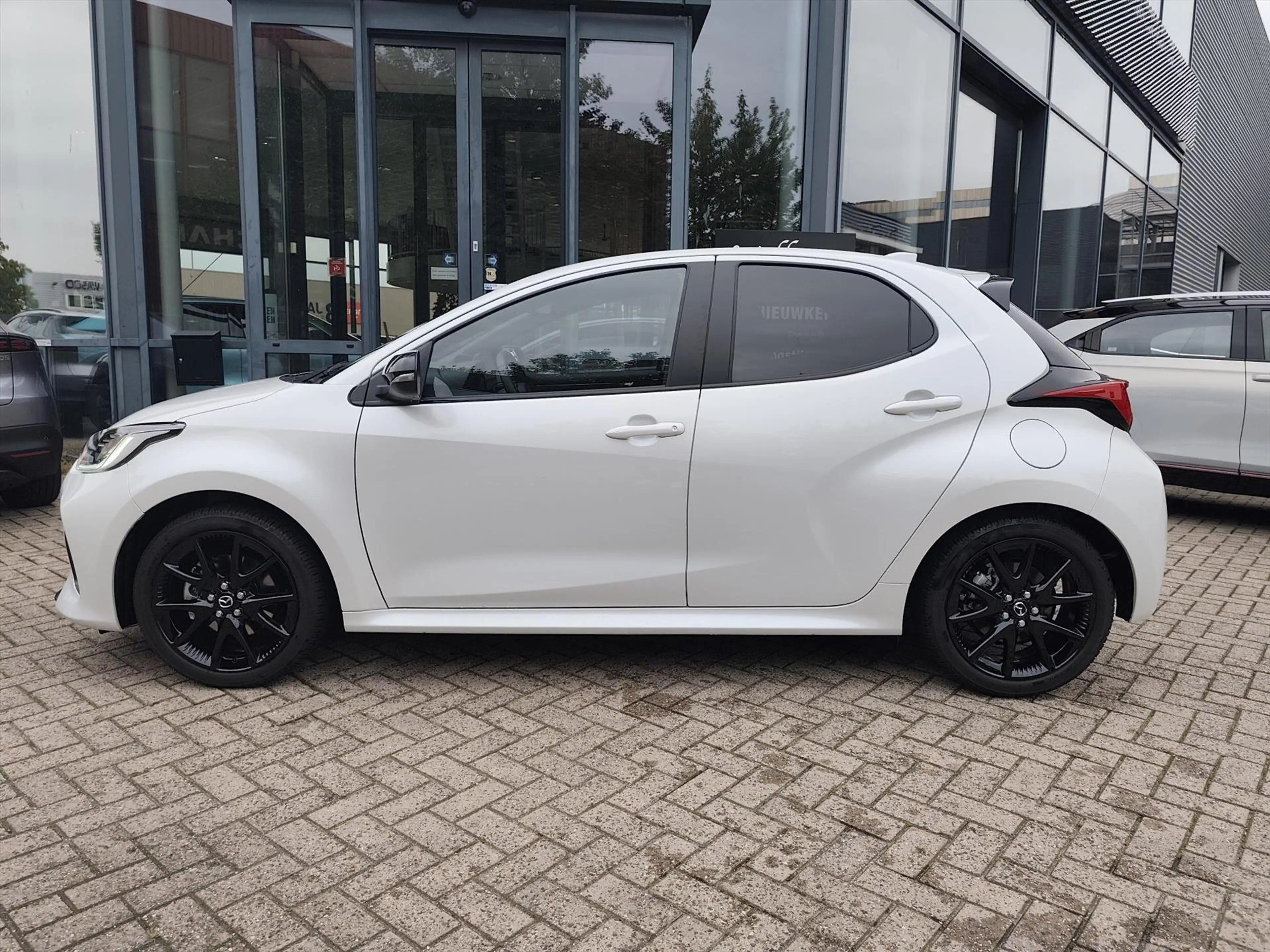 Mazda 2 Hybrid 1.5 Hybrid 116pk CVT Homura | Navi via Appl — photo 9