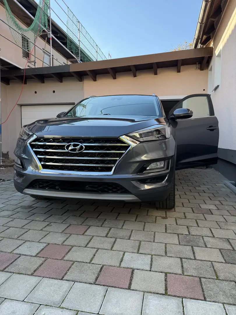 Hyundai TUCSON 1.6 GDi 4WD DCT Premium - 1