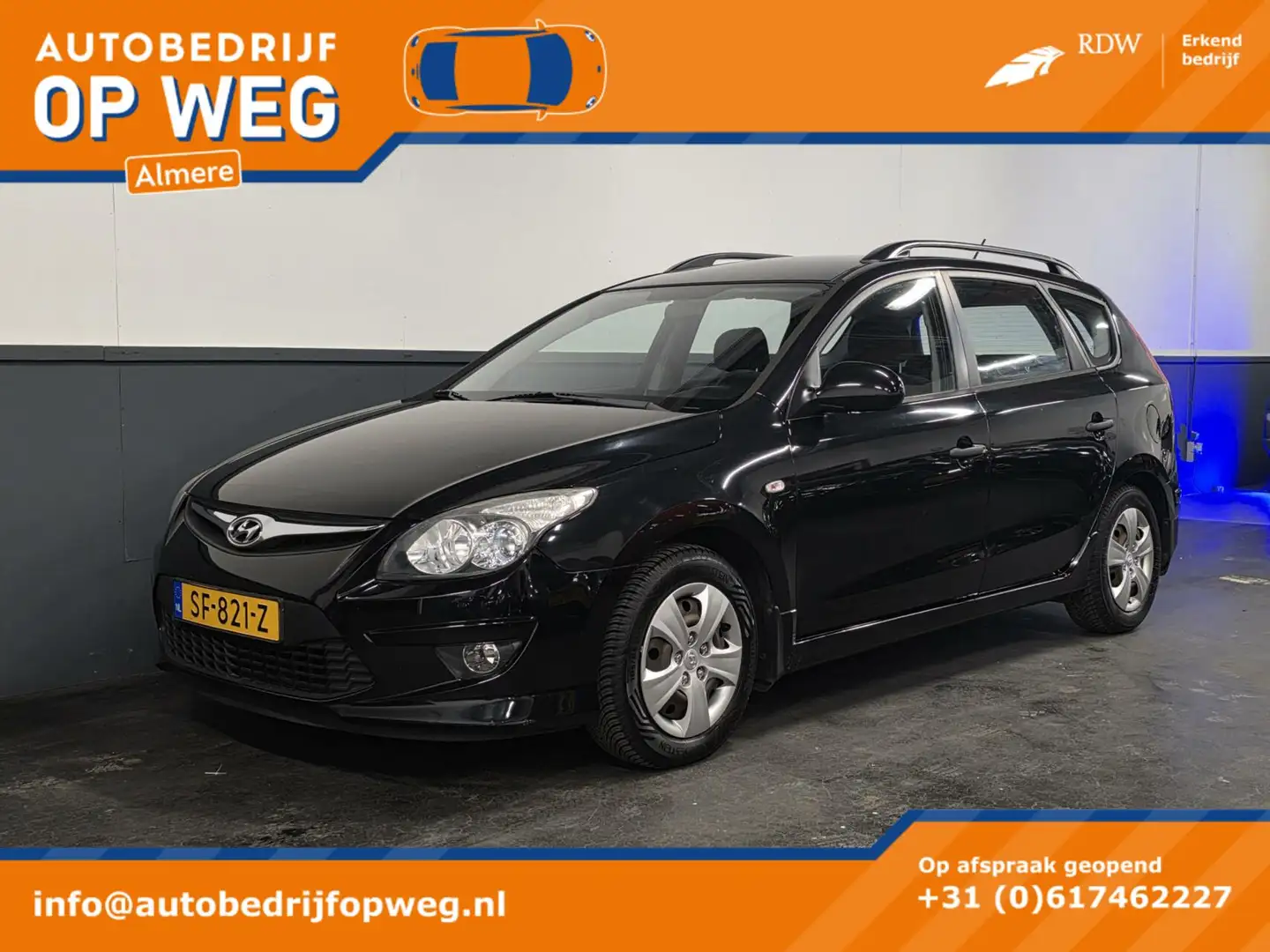 Hyundai i30 CW 1.4i i-Drive | Trekhaak | Climat Control Nero - 1