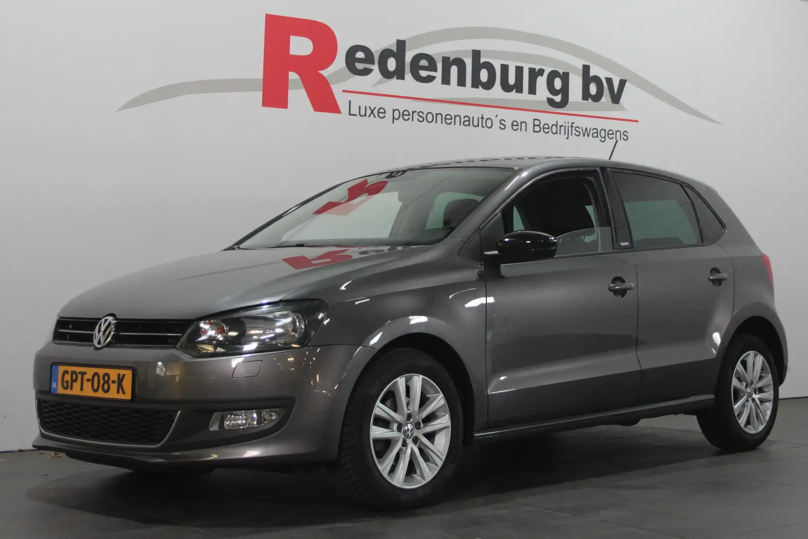 Volkswagen Polo 1.2 TSI Highline - Airco / Cruise / Stoelverw. Grijs - 1