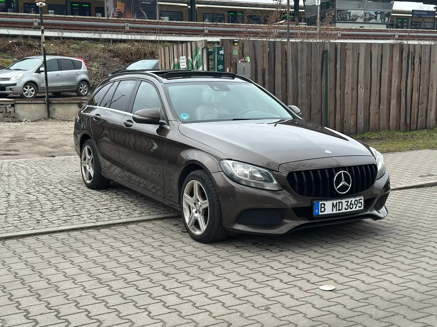 Mercedes-Benz C 200 C 200 T d G-Tronic Plus AUT*NAVI*LEDER*PANO Bruin - 1