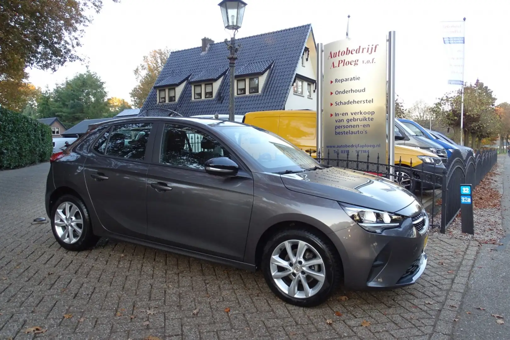 Opel Corsa 1.2 Edition 5 drs airco LMV PDC NWST Gris - 1