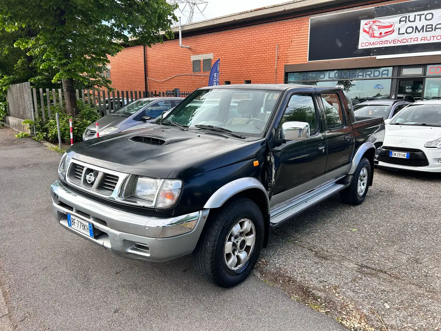 Nissan King Cab double 2.5 navara clima 4x4 Negru - 1