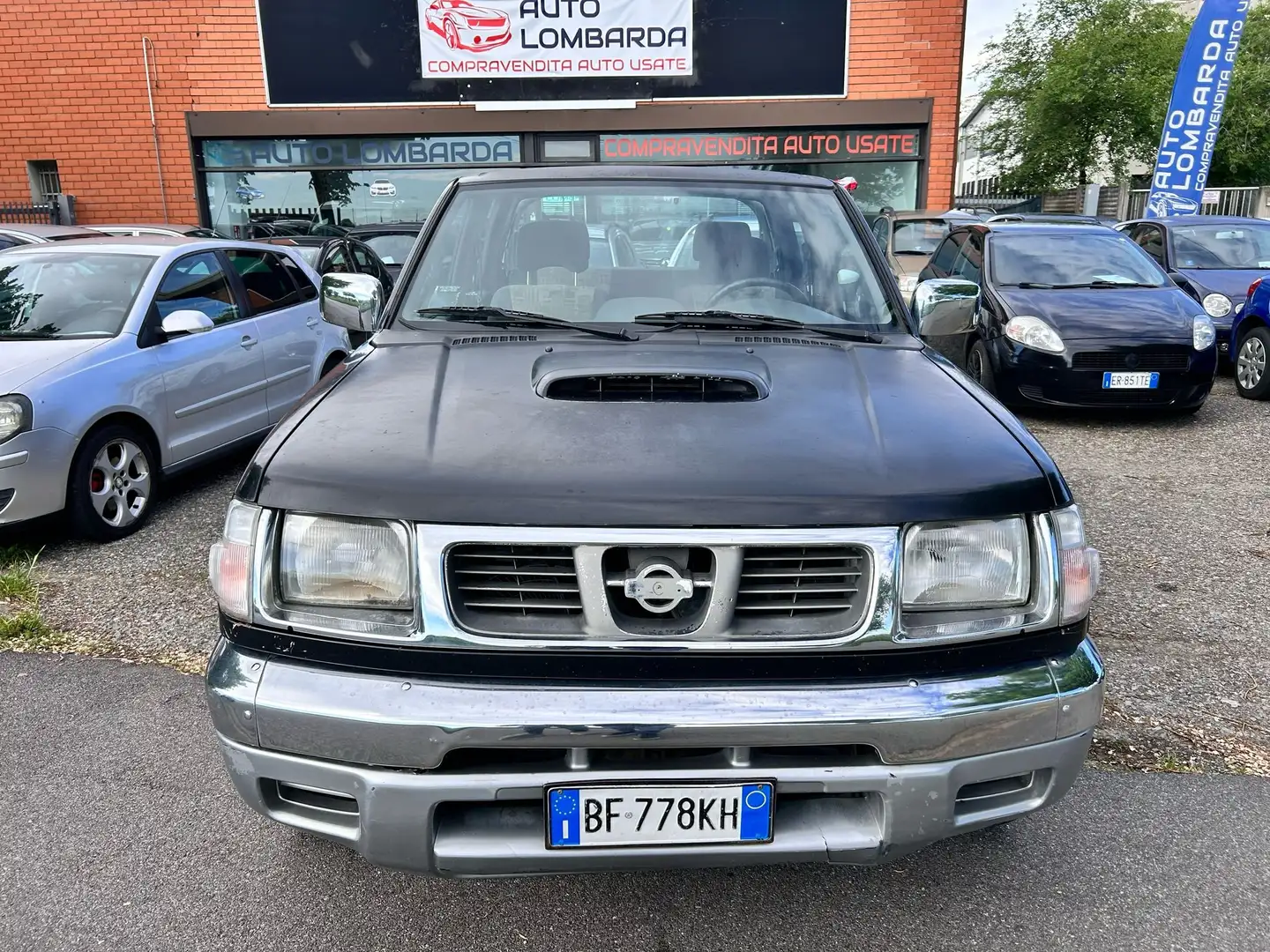 Nissan King Cab double 2.5 navara clima 4x4 Negru - 2