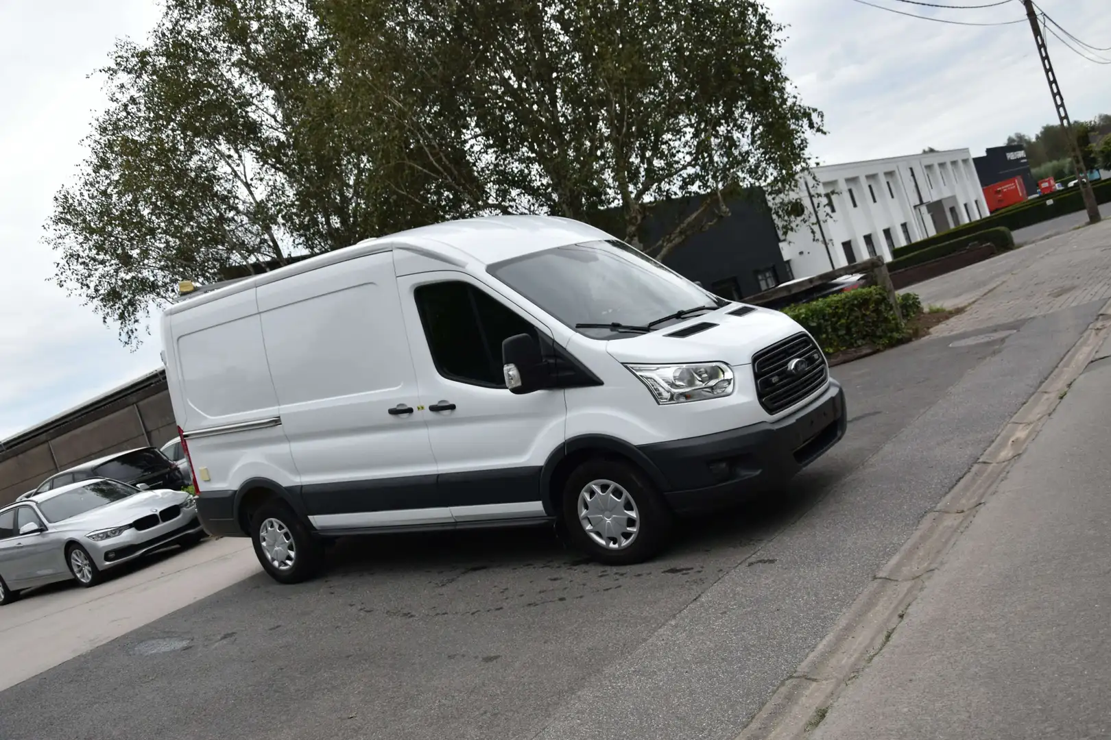 Ford Transit 2.0 TDCi 2T 350M L2H2 Camera/Navigatie/Garantie Wit - 1
