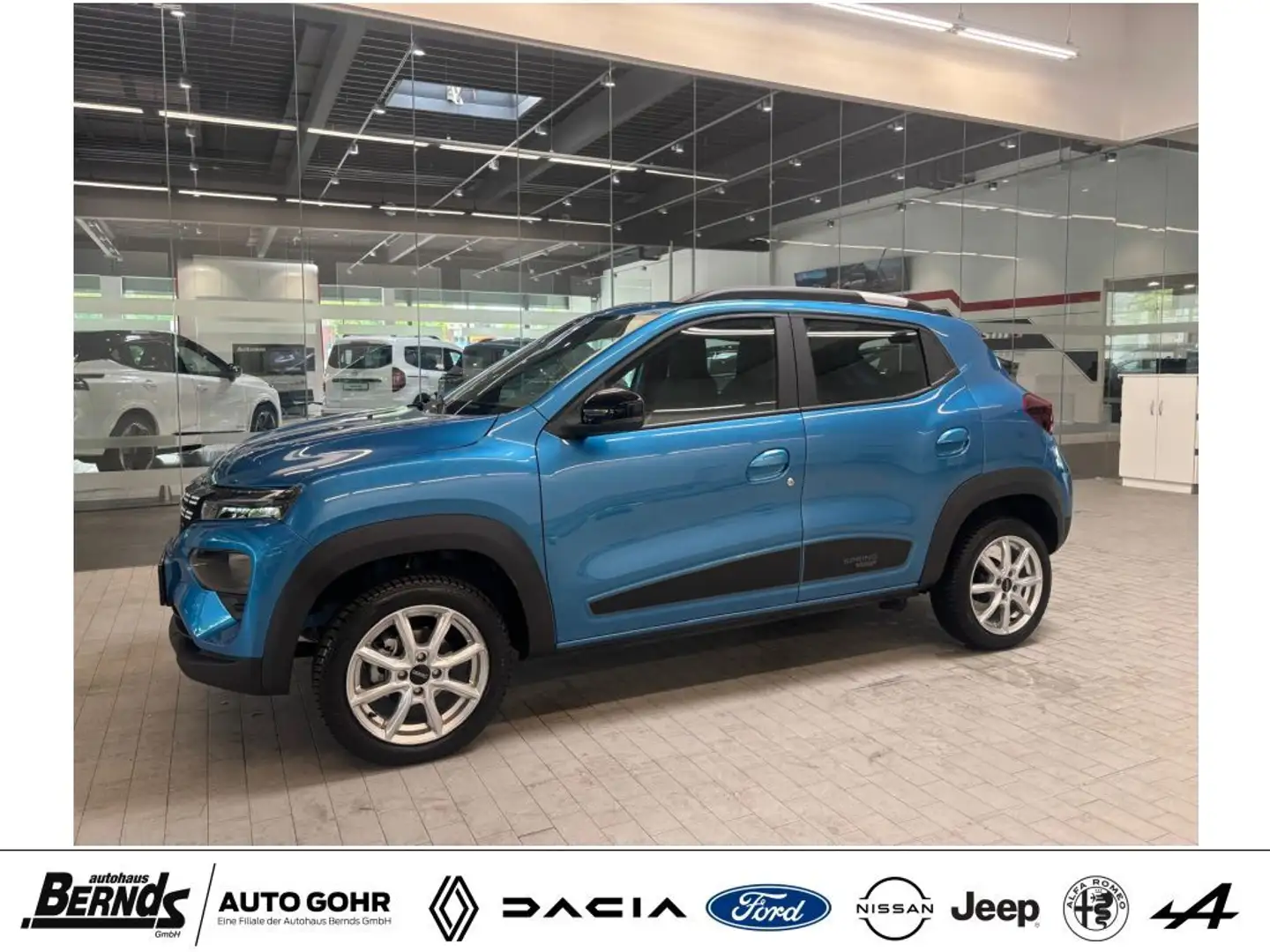 Dacia Spring ESSENTIAL CCS-LADEANSCHLUSS | ALLWETTERRÄDER Blau - 1