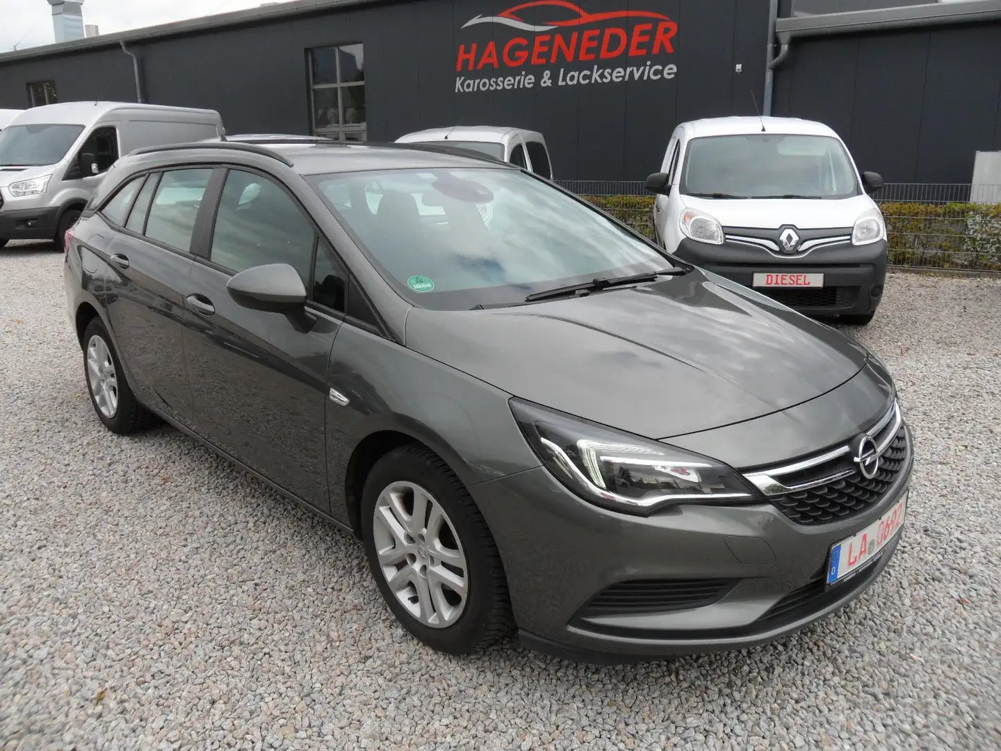 Opel Astra ST 1.4 Turbo Edition Automatik/NAVI Grau - 1
