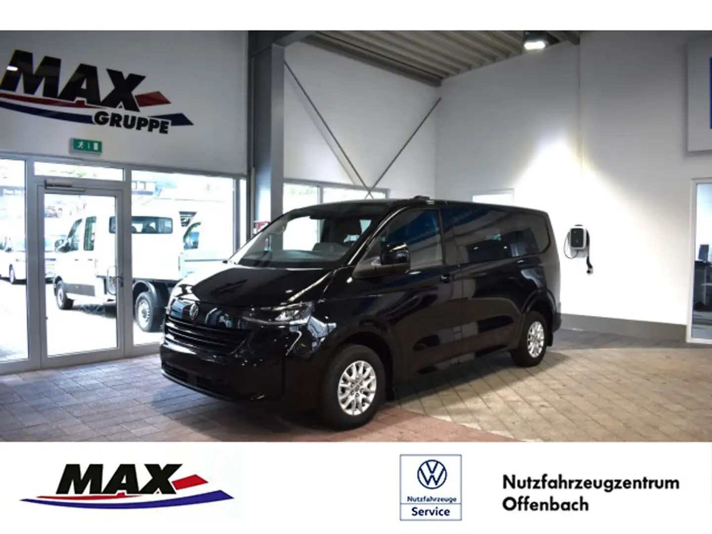 Volkswagen T6 Caravelle e-Caravelle Life KR 160 kW 9- SITZER+NAVI+PDC+KA Schwarz - 1