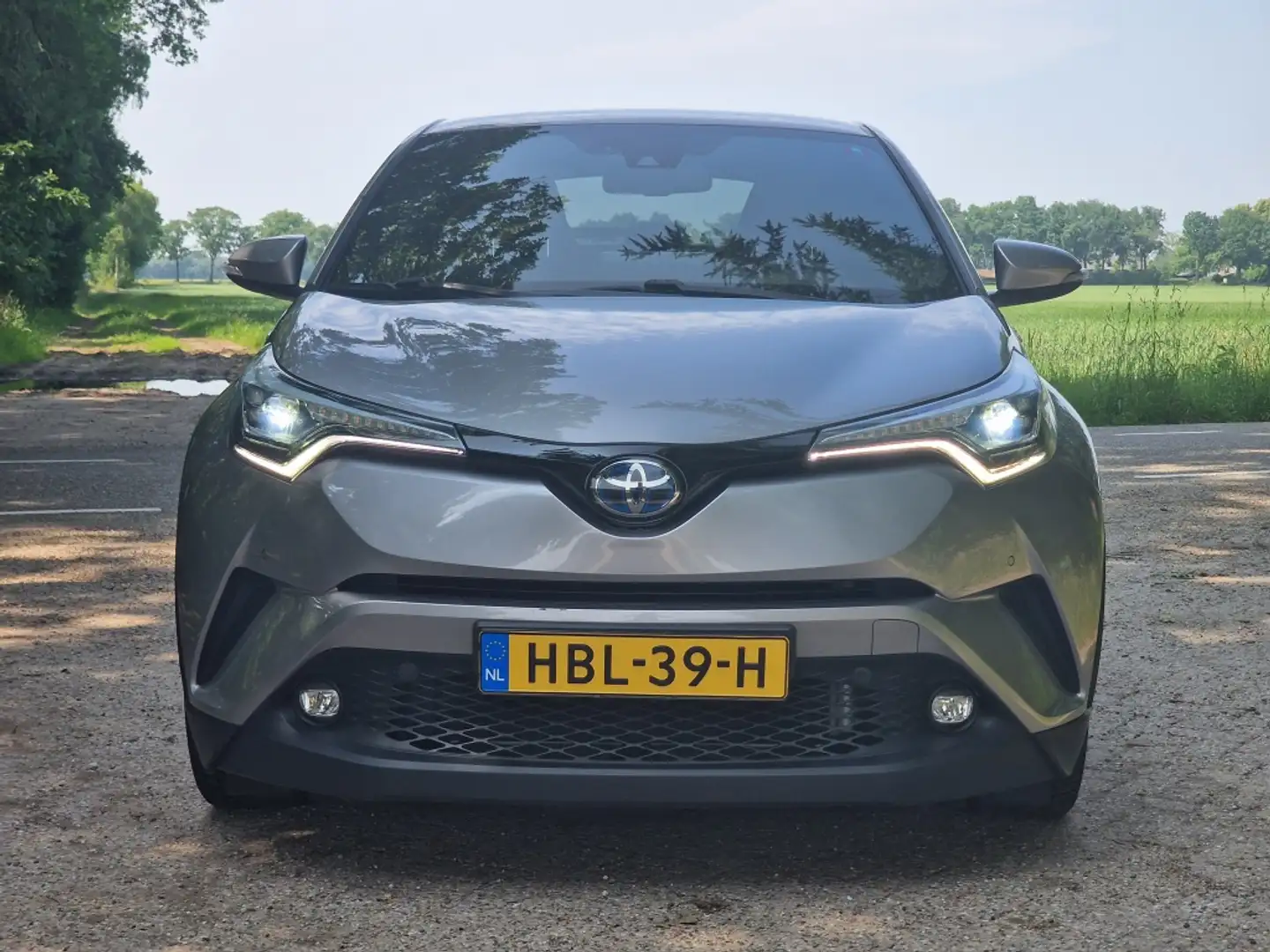 Toyota C-HR 1.8 Hybrid Executive | 24mnd Garantie | Incl. Beur Grigio - 2