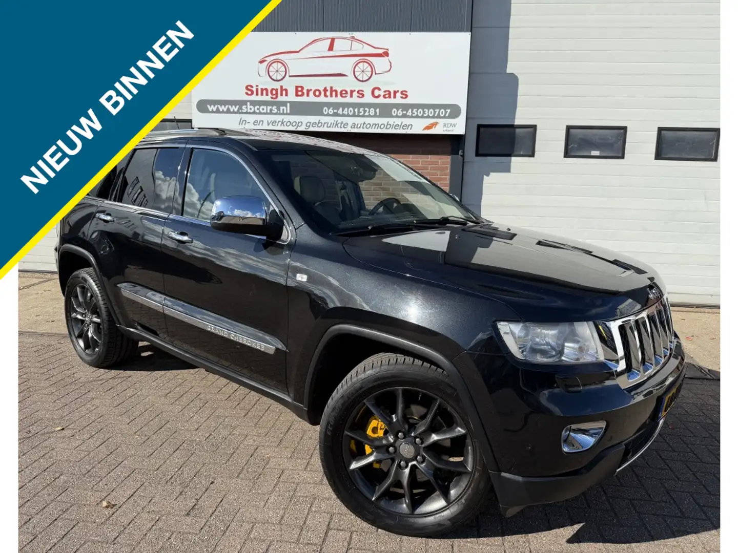 Jeep Grand Cherokee 3.6 Overland AUT NAP NAVI XENON INRUIL MOG !! Zwart - 1