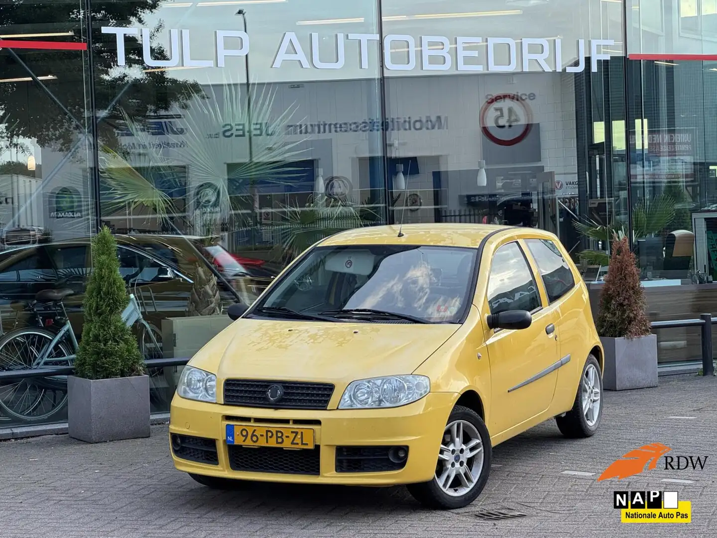 Fiat Punto 1.2-16V SportSound 2004 Airco goed onderhouden Geel - 1