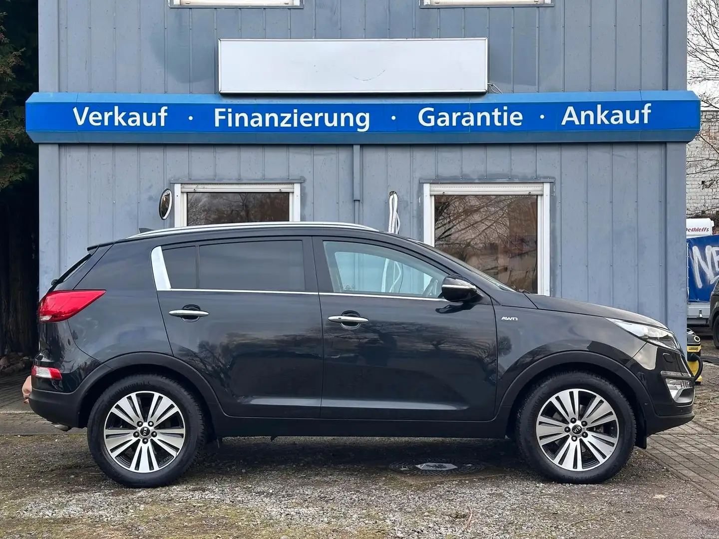 Kia Sportage 2.0 GDI Spirit 4WD*1.Hand*Temp*SHZ*Navi Schwarz - 2
