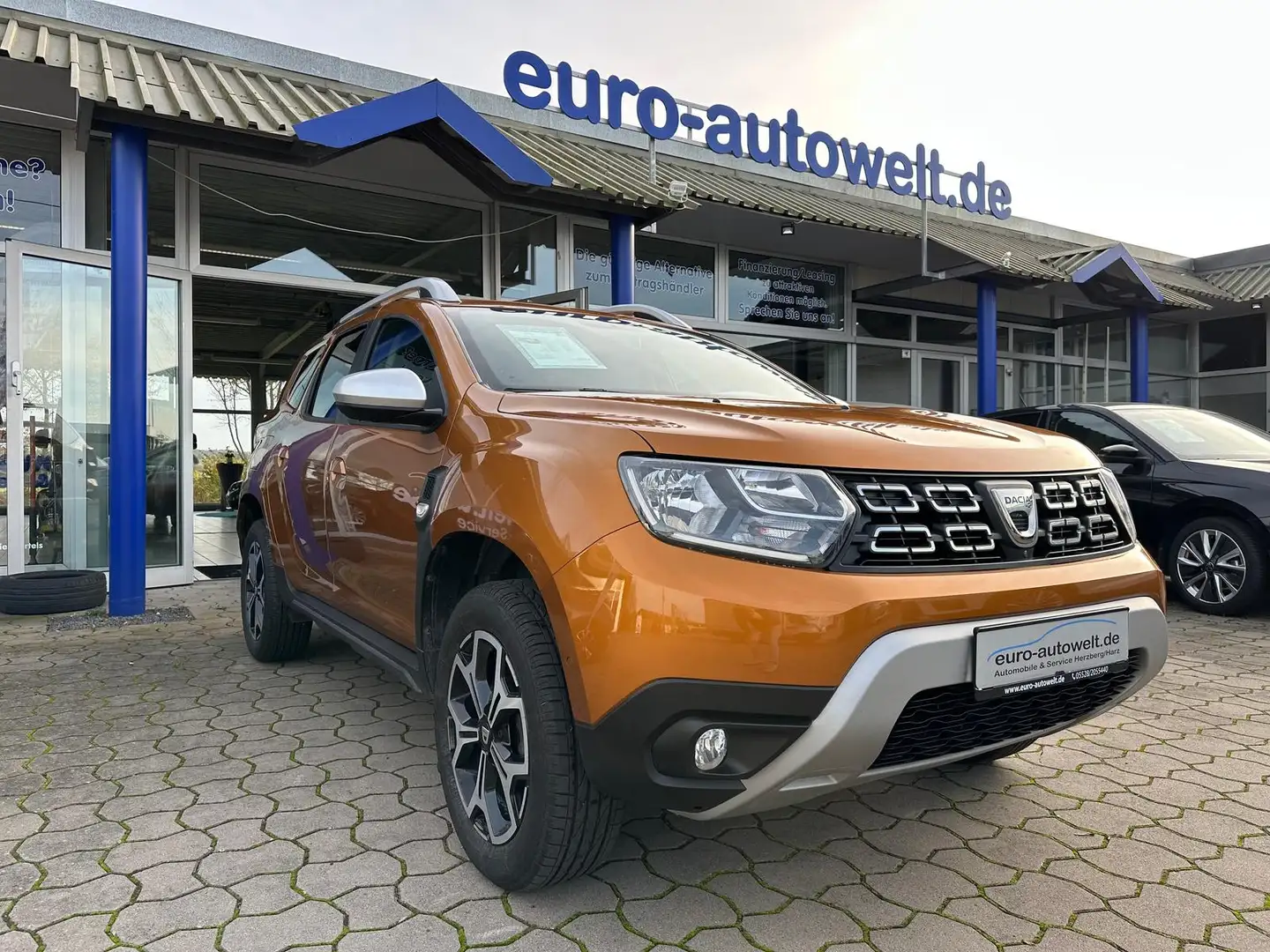 Dacia Duster 1.3TCE Adventure *PDC+Kam.*AHK*Navi*SHZ Orange - 1