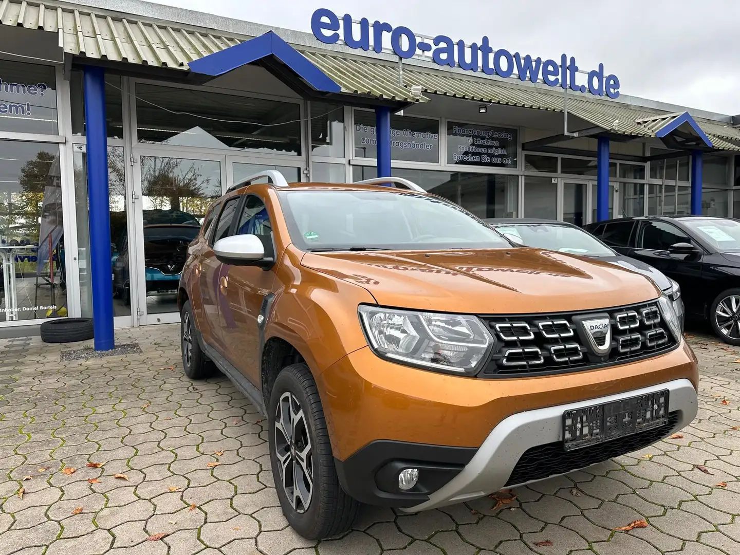 Dacia Duster 1.3TCE Adventure *PDC+Kam.*AHK*Navi*SHZ Orange - 1