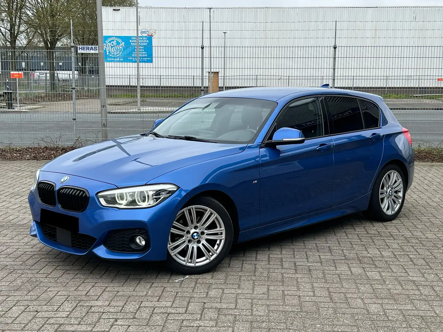 BMW 118 dA ✅ M-pakket/Led/Navi prof/Lane assist/ACC/PDC Blauw - 1