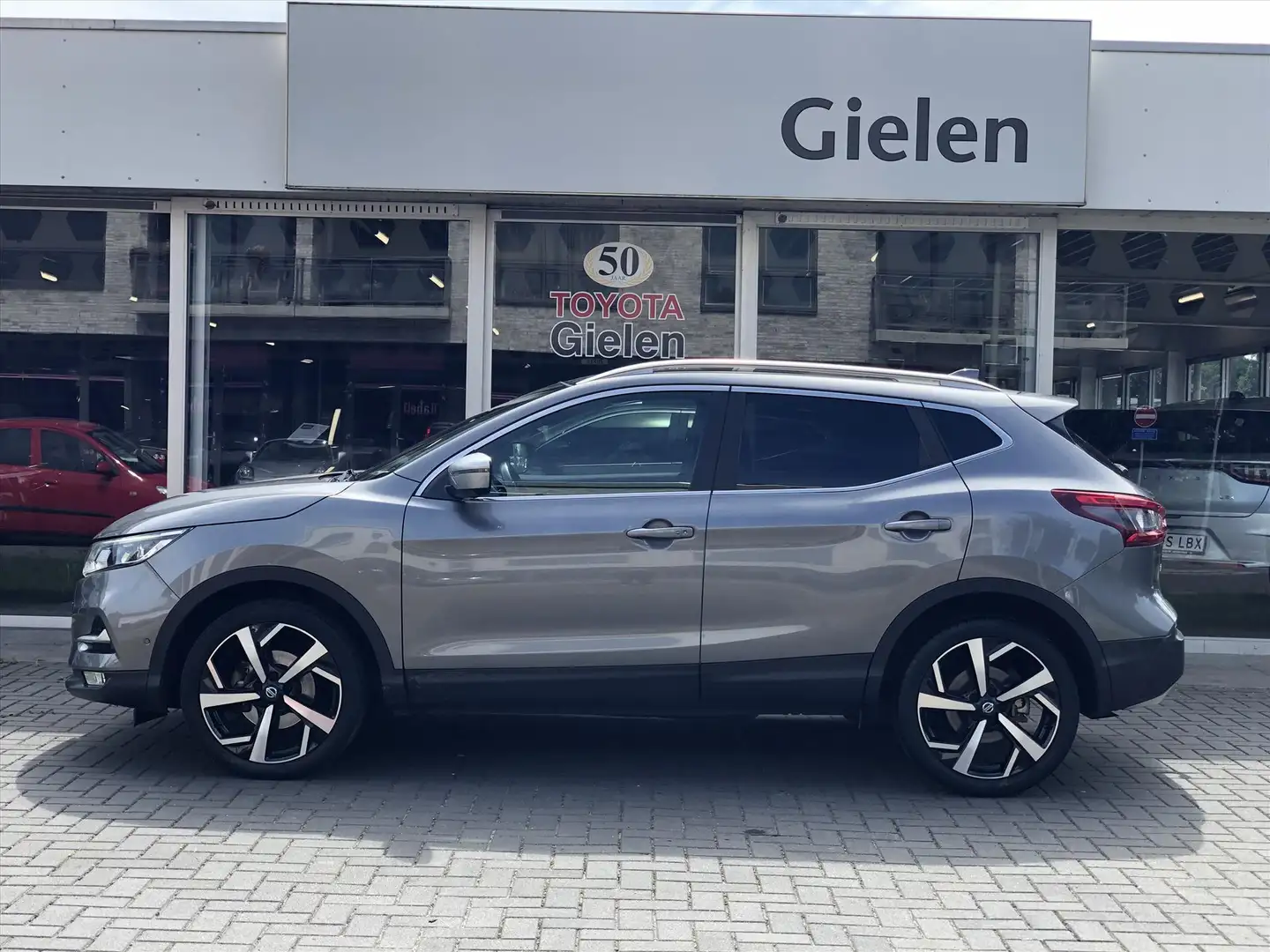 Nissan Qashqai 1.2 DIG-T Tekna+ | Eerste eigenaar, Trekhaak, Bose Gris - 2
