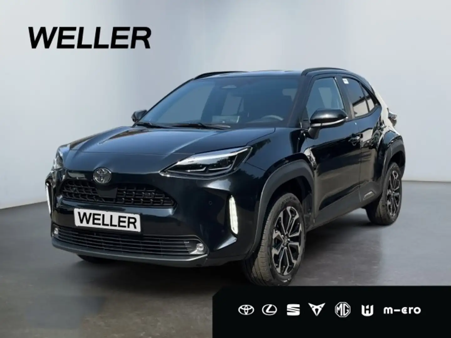 Toyota Yaris Cross Hybrid 130 1.5 Teamplayer *RCam*ACC* Zwart - 1