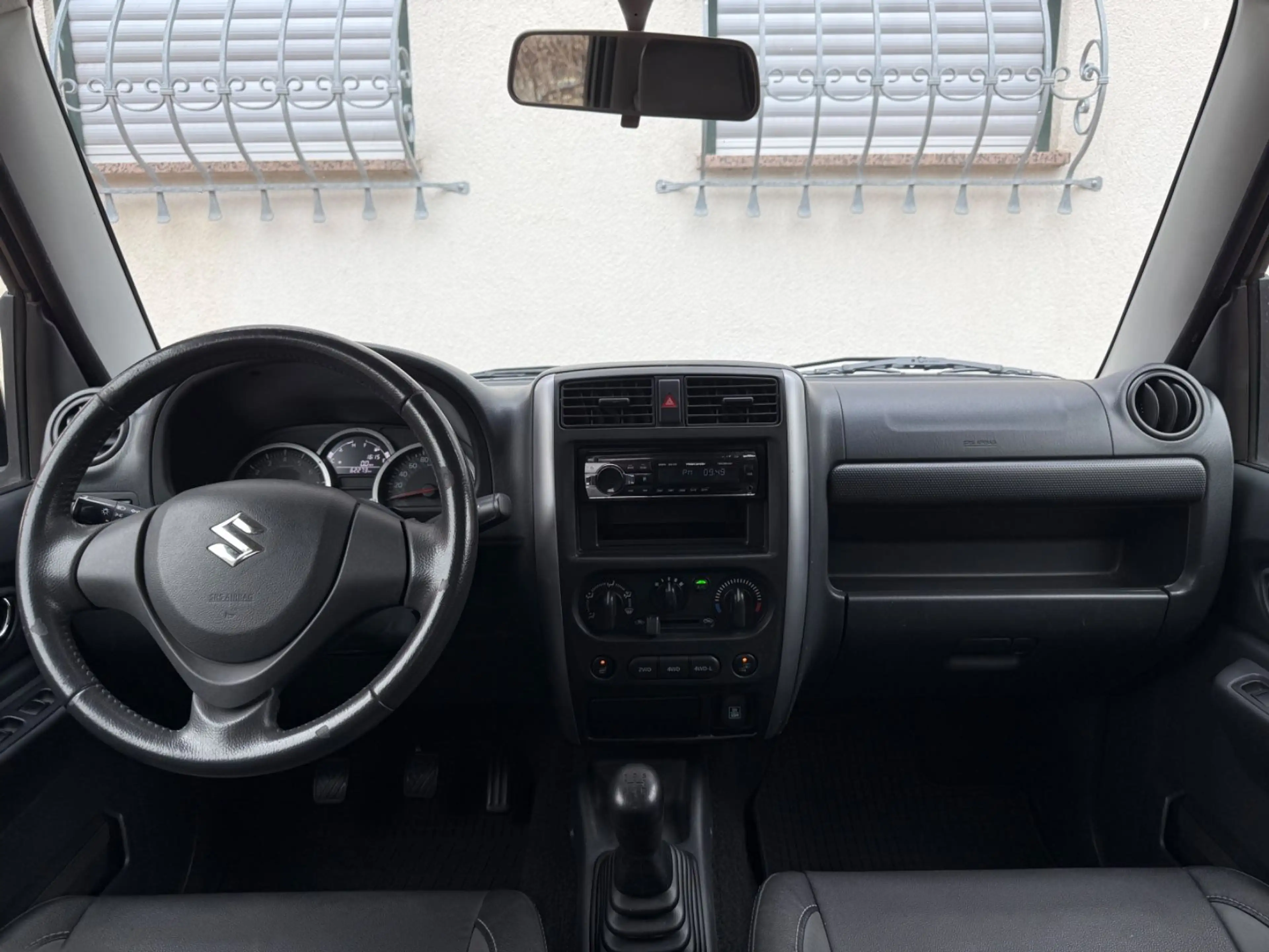 Suzuki Jimny STYLE 4x4 LEDER KLIMA ALU SHZ NEBELSCH. — photo 14