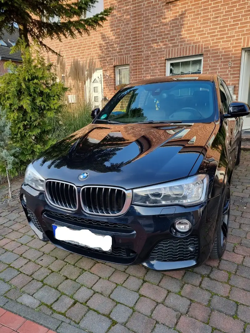 BMW X4 M xDrive20d Aut. M Sport Zwart - 1