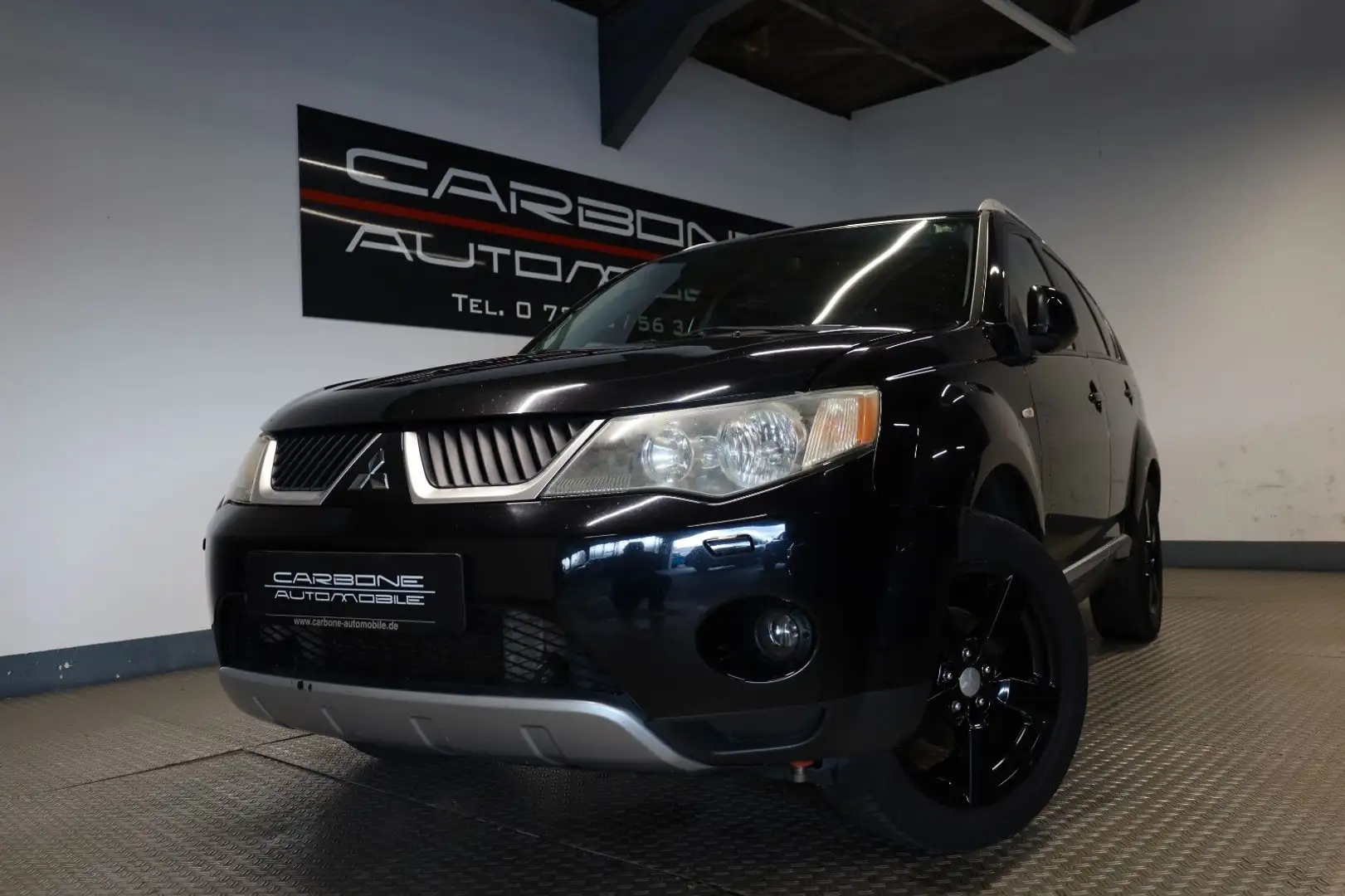 Mitsubishi Outlander 2.0 DI-D Intense**7-Sitzer+AHK** Schwarz - 1