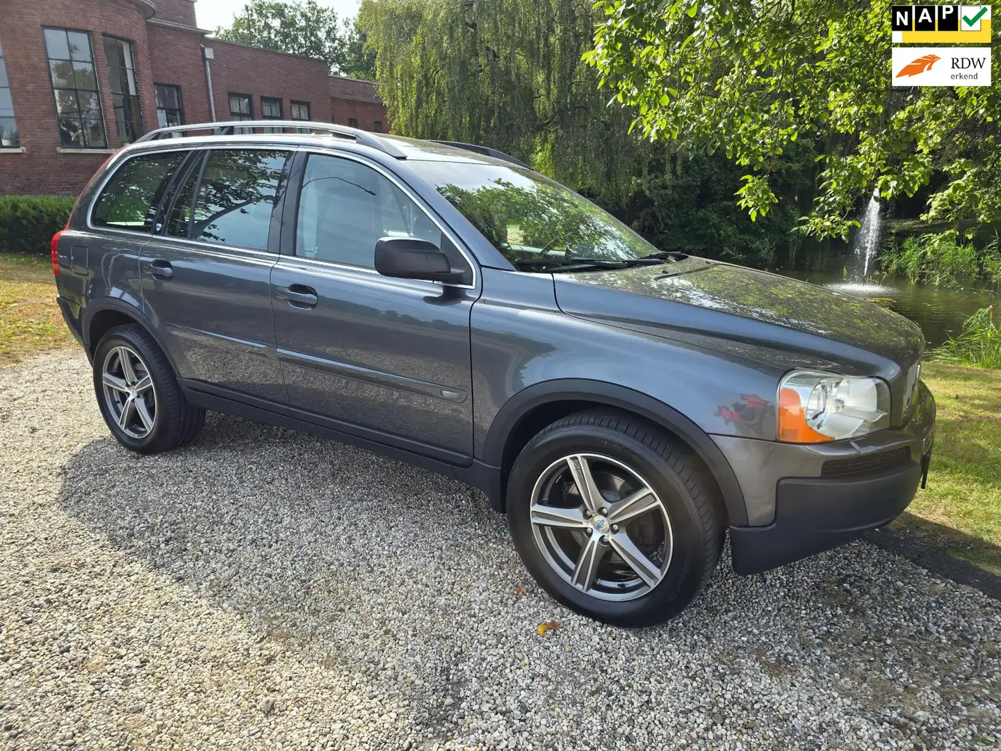 Volvo XC90 4.4 V8 Executive 7-PERSOONS XENON/dak/LEDER Grijs - 1