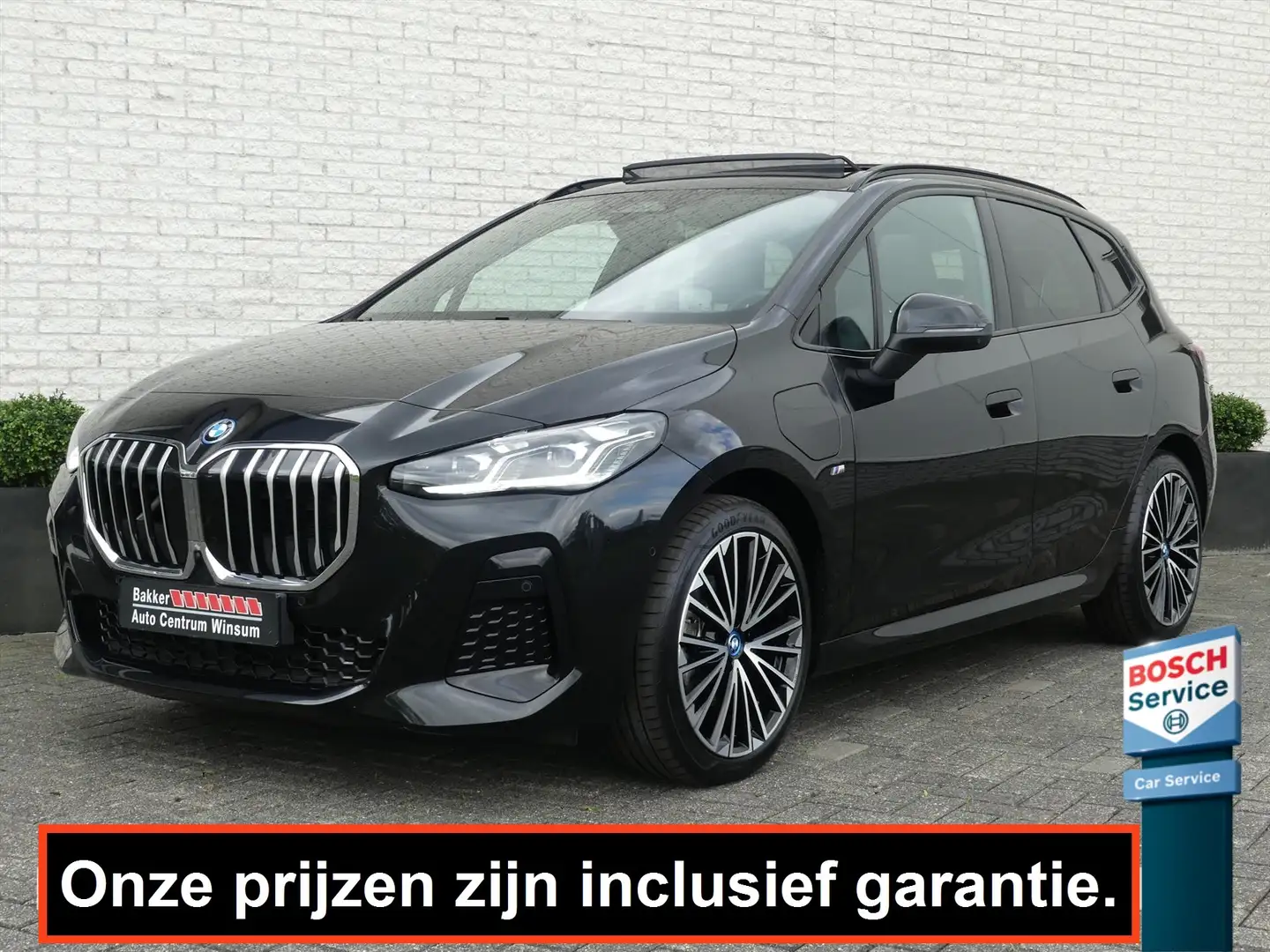 BMW 225 2-Serie Active Tour. 225E M-SPORT 245PK XDRIVE PAN Zwart - 1