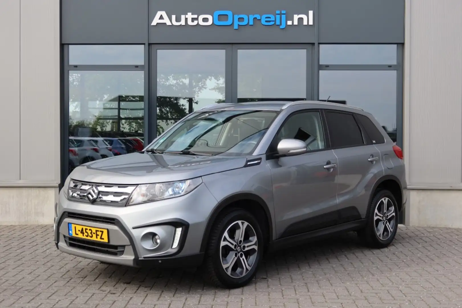 Suzuki Vitara 1.6 High Executive NAVI, Camera, Leder bekleding, Gris - 1