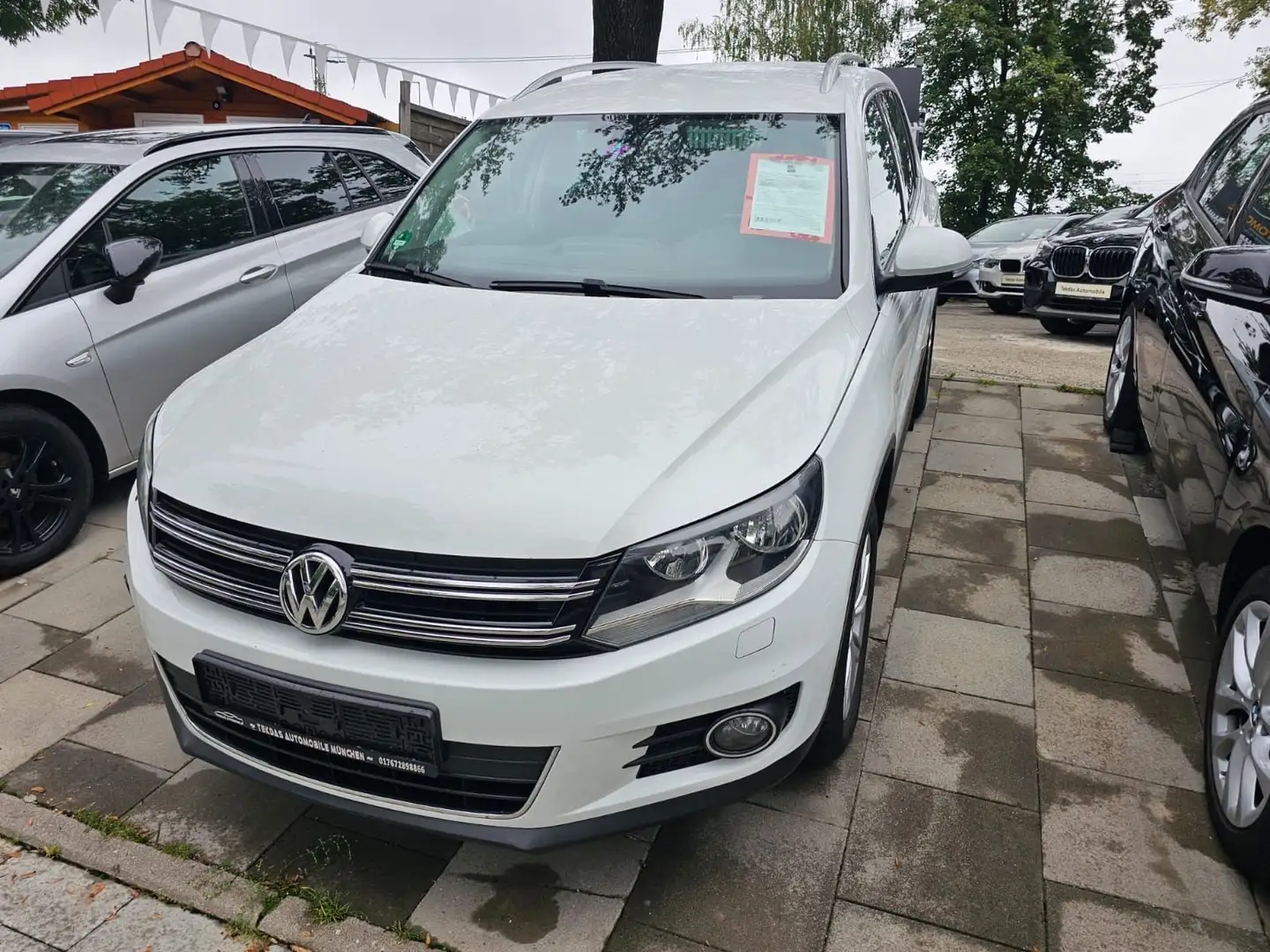 Volkswagen Tiguan Sport & Style BMT 4Motion PDC/NAVI Weiß - 1