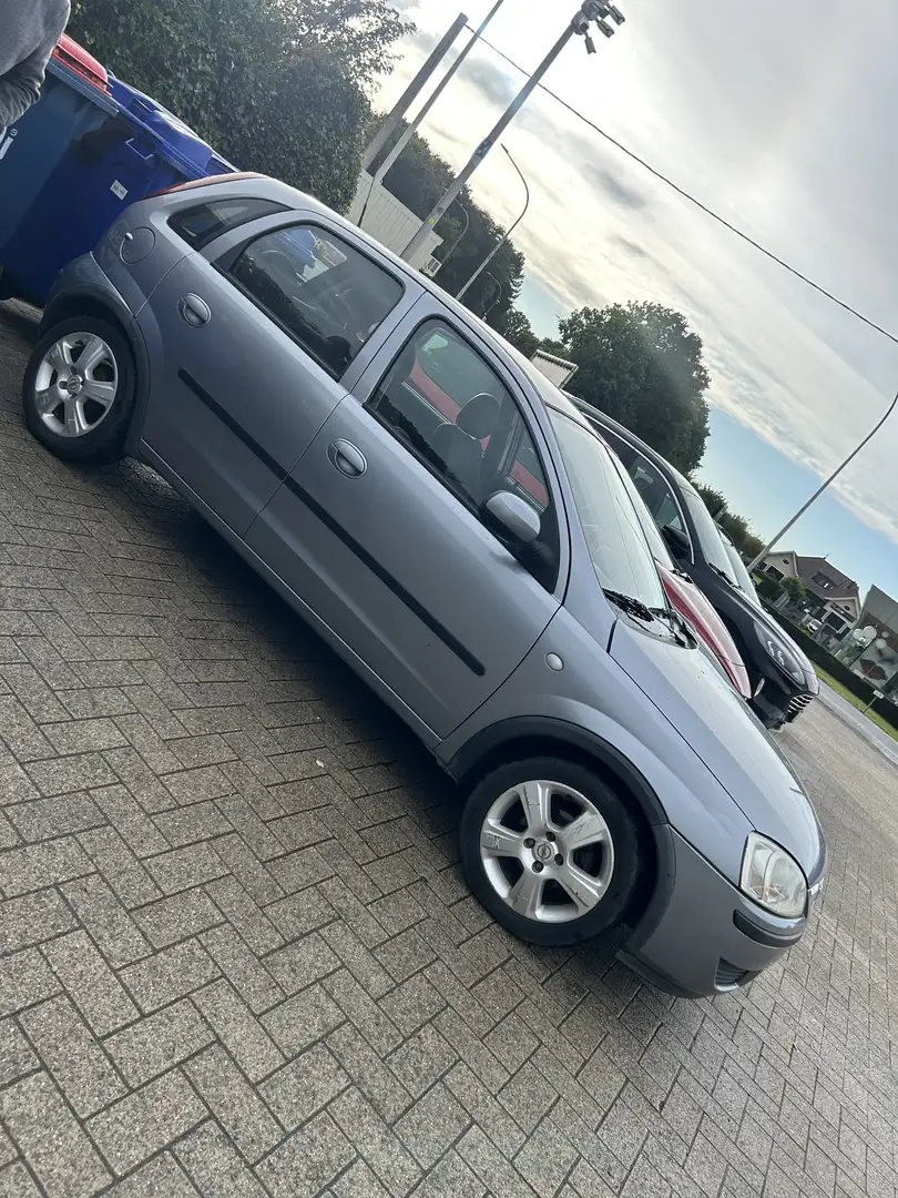Opel Corsa 1.2i XEP 16v Sport Easytronic Grijs - 1