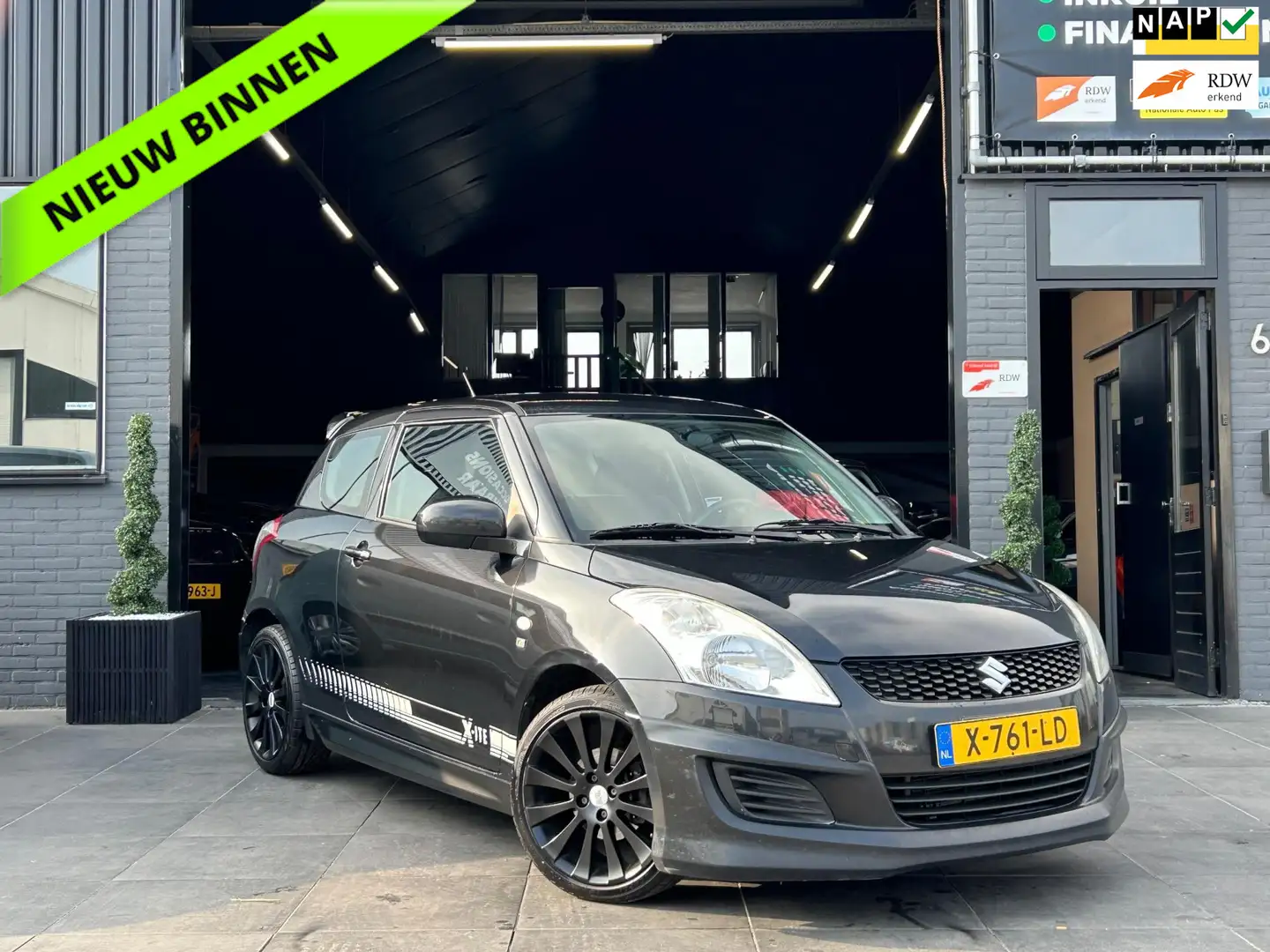 Suzuki Swift 1.2 Exclusive EASSS|Airco|Elek.ram|APK|Sportief Fekete - 1