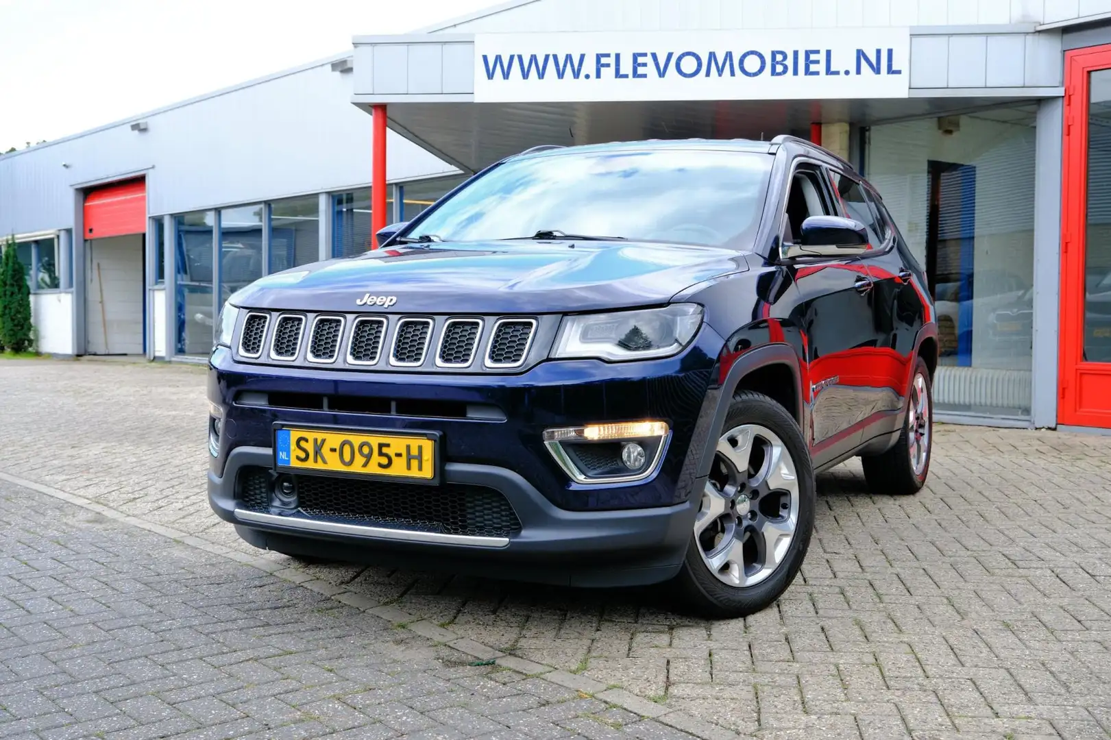 Jeep Compass 1.4 140pk MultiAir Opening Edition Plus Leder|Navi Blauw - 1
