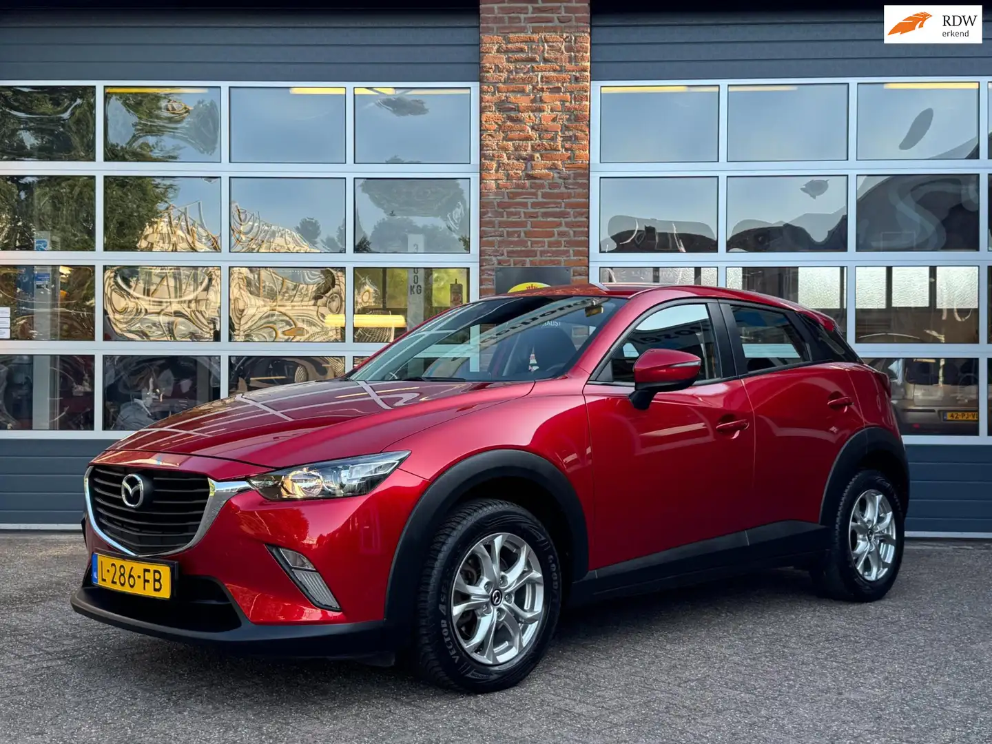 Mazda CX-3 2.0 SkyActiv-G 120 SkyLease+, Navi, Cruise, LM Rood - 1