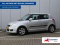 Suzuki Swift 1.3 Exclusive | Airco | Keyless | BOVAG-garantie | Grau - thumbnail 1