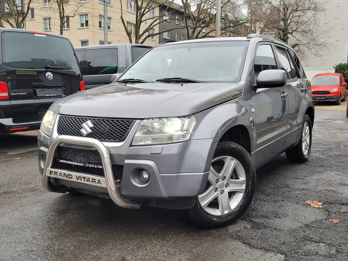 Suzuki Grand Vitara 1.9 DDIS 4x4*Leder*Navi*Xen*17"*S-Dach*Keyless*AHK Grau - 2