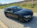 BMW 140 M140i Aut. Special Edition Zwart - thumbnail 1