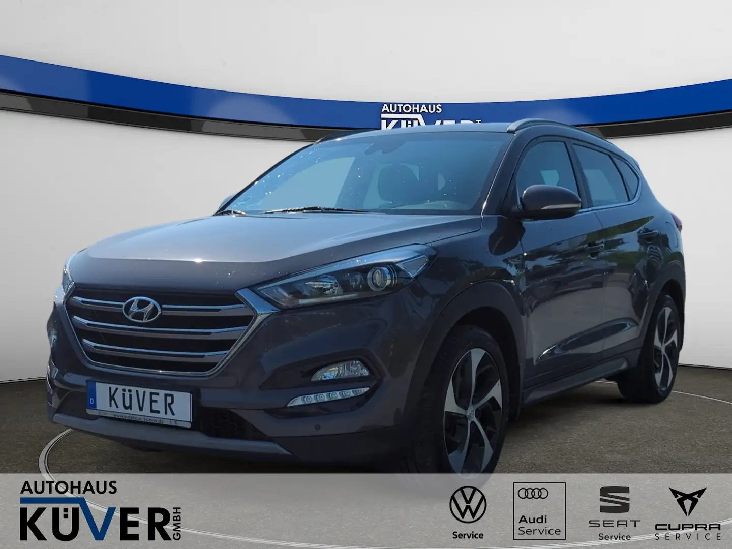 Hyundai TUCSON 1,6 Benzin DCT 4WD+GRA+LED+Shzg.+Einparkh Braun - 1