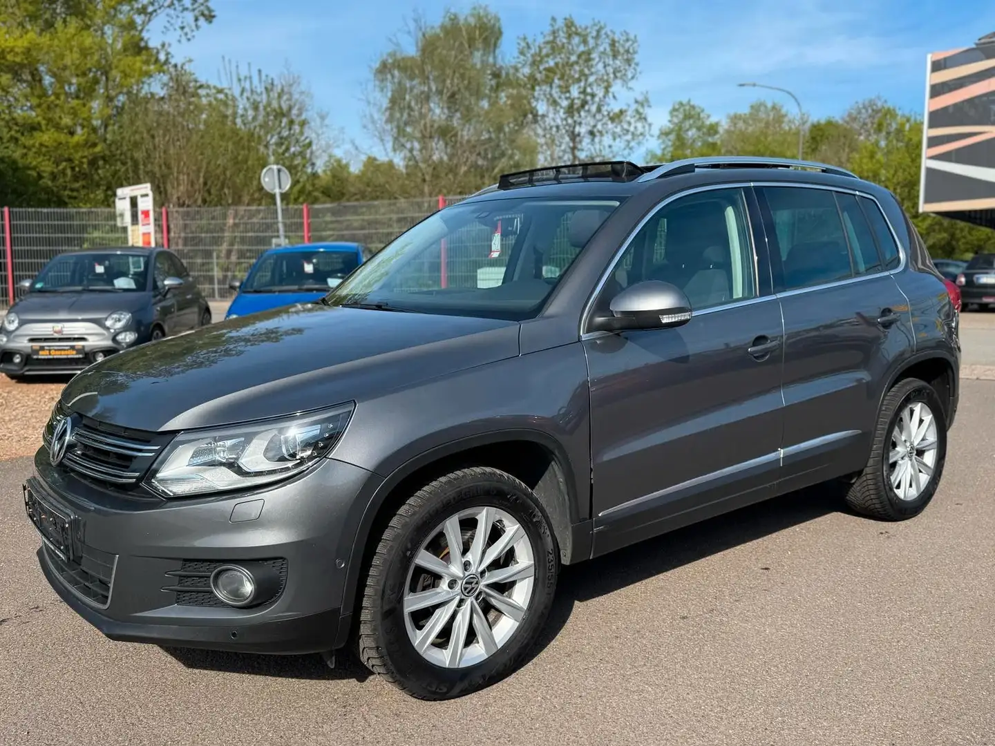 Volkswagen Tiguan Sport & Style BMT 4Motion DSG+Navi+Panora Gris - 1