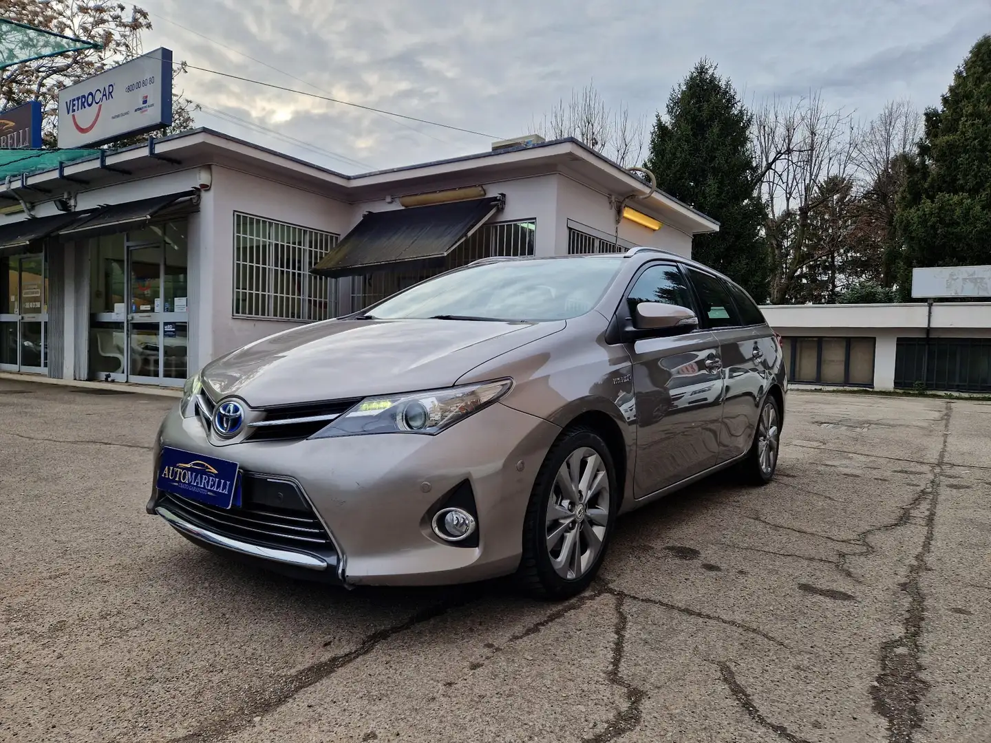 Toyota Auris Touring Sport 1.8 hybrid Lounge Bronzo - 1