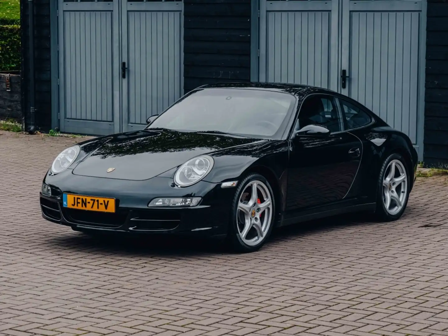 Porsche 997 Carrera 4 Coupe Schwarz - 1