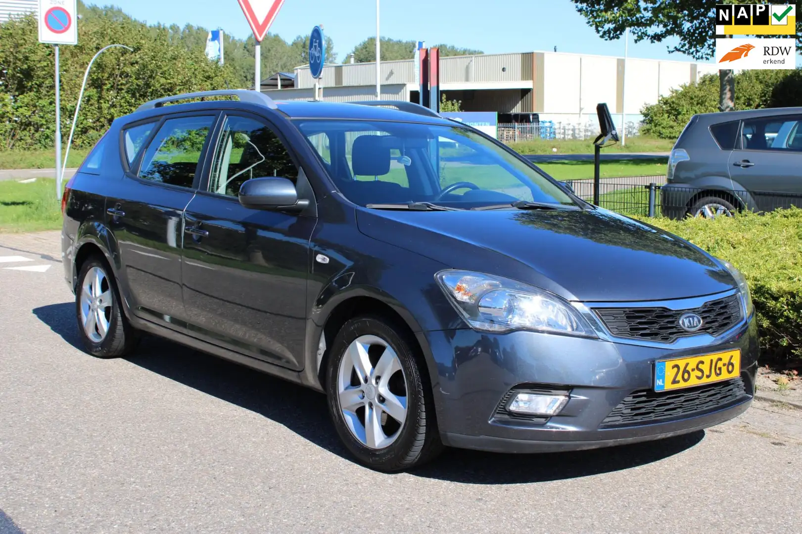 Kia Ceed / cee'd Sporty Wagon 1.4 CVVT SEVEN-uitv/AIRCO/LM-VELG/AUX Grijs - 1
