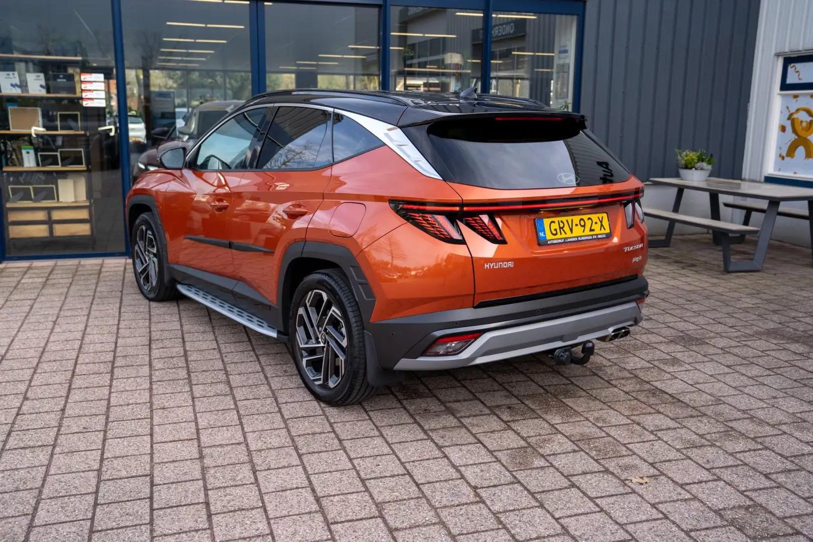 Hyundai TUCSON 1.6 T-GDI PHEV Premium | Prijs rijklaar incl 12 mn Orange - 2