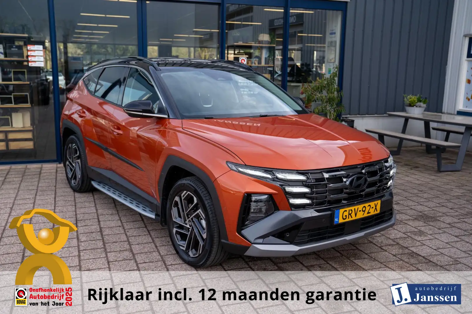 Hyundai TUCSON 1.6 T-GDI PHEV Premium | Prijs rijklaar incl 12 mn Orange - 1