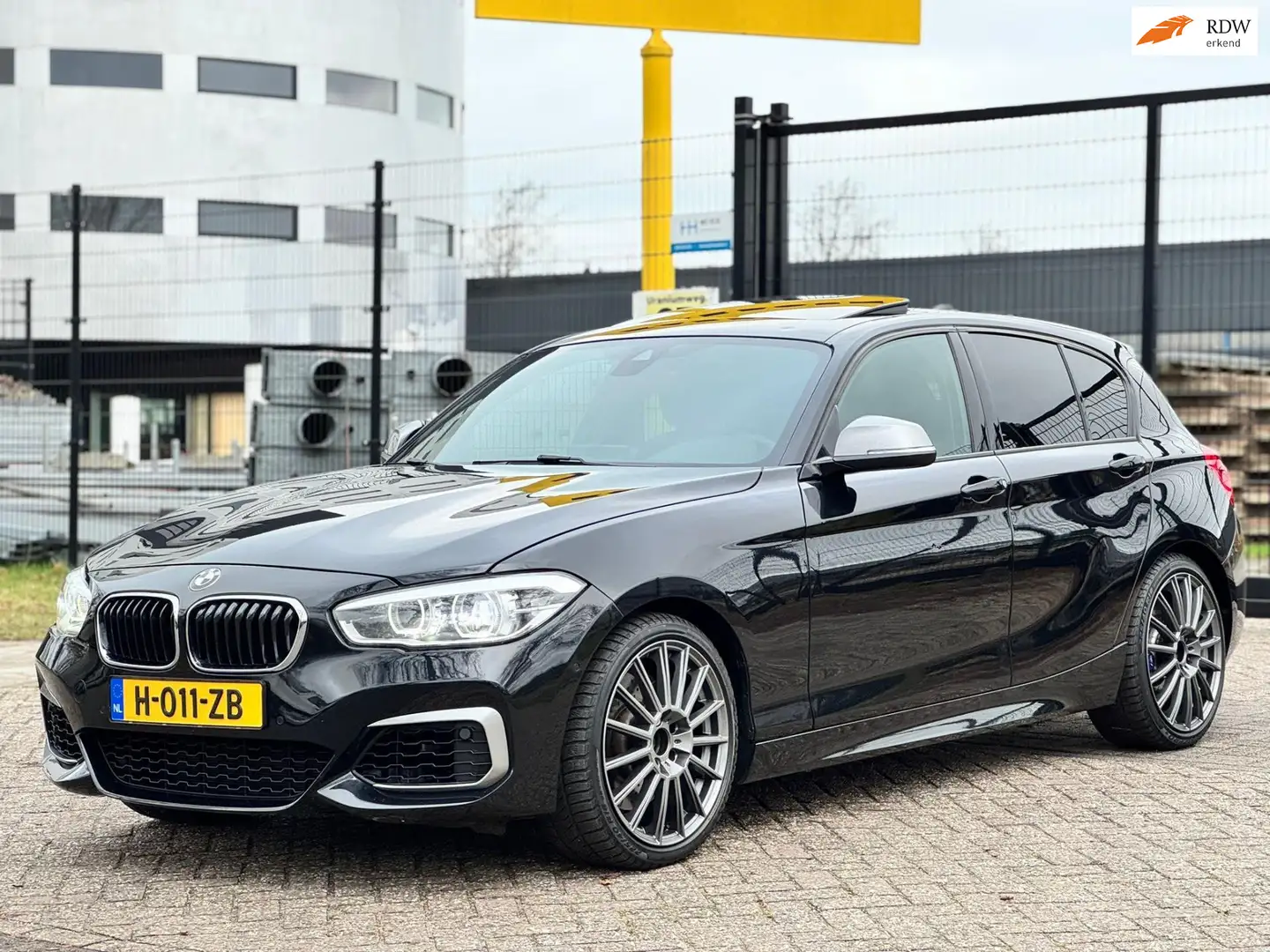 BMW 140 1-serie M140i xDrive Centennial High Executive Schwarz - 1
