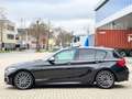 BMW 140 1-serie M140i xDrive Centennial High Executive Schwarz - thumbnail 2
