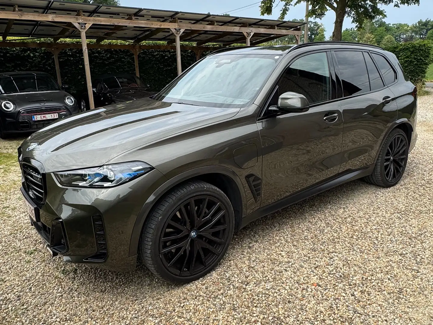 BMW X5 X5 xDrive50e M-Pack / 22" + Set winterwielen 21" Bruin - 1