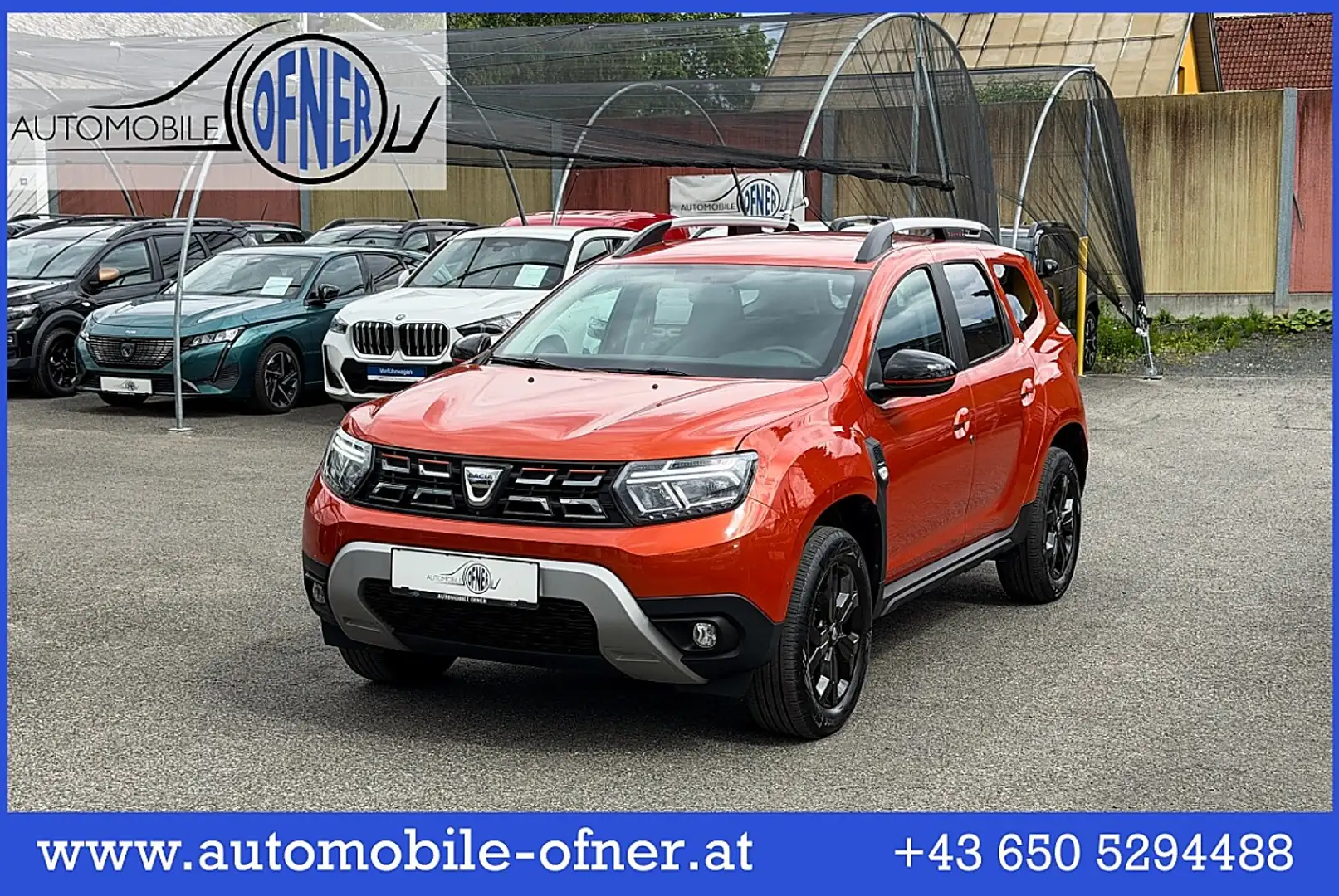 Dacia Duster TCe 150 PF EDC Extreme Aut. AHK LED PDC 360°Mul... Orange - 1