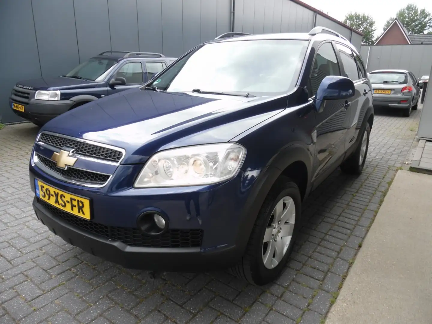 Chevrolet Captiva 2.4I STYLE 2WD Blauw - 1