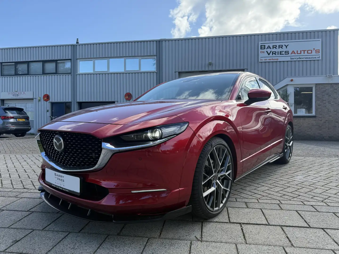Mazda CX-30 2.0 e-SkyActiv-G M Hybrid Luxury | Bose | Head-up Rouge - 1